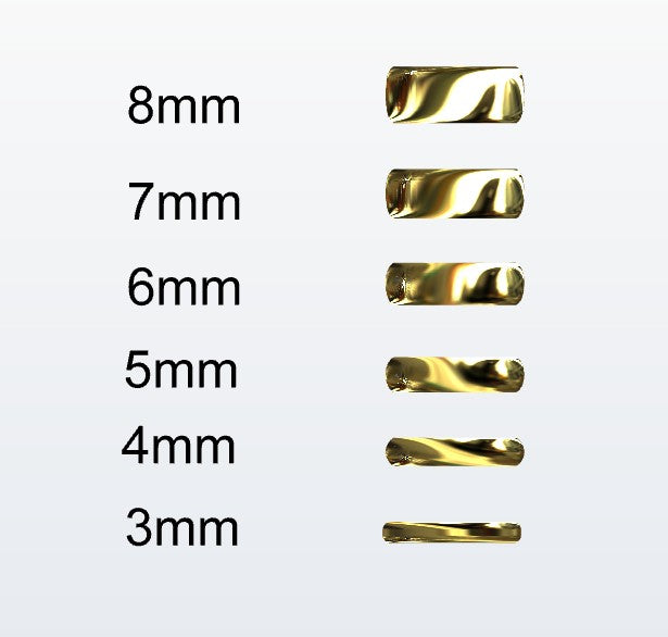 Set of gold D-shaped rings with varying widths on a white background