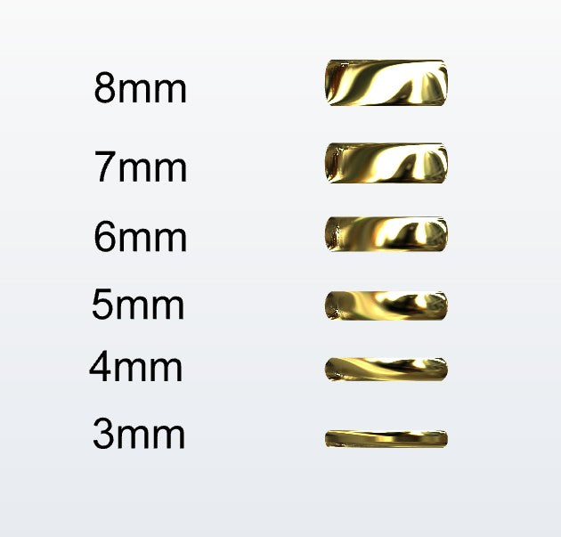 Set of gold D-shaped rings with varying widths on a white background