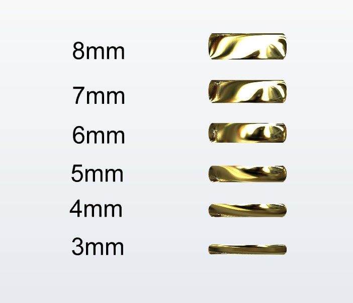 Set of gold D-shaped rings with varying widths on a white background