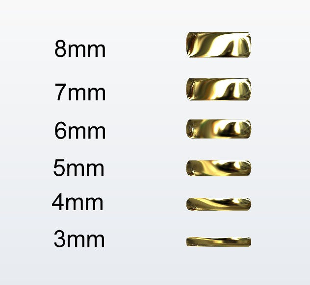 Set of gold D-shaped rings with varying widths on a white background