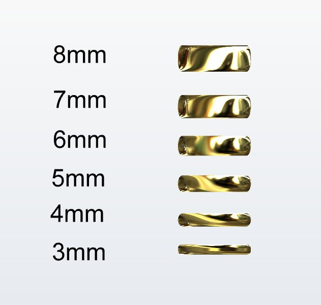 Set of gold D-shaped rings with varying widths on a white background