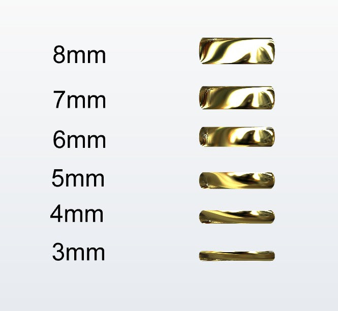 Set of gold D-shaped rings with varying widths on a white background