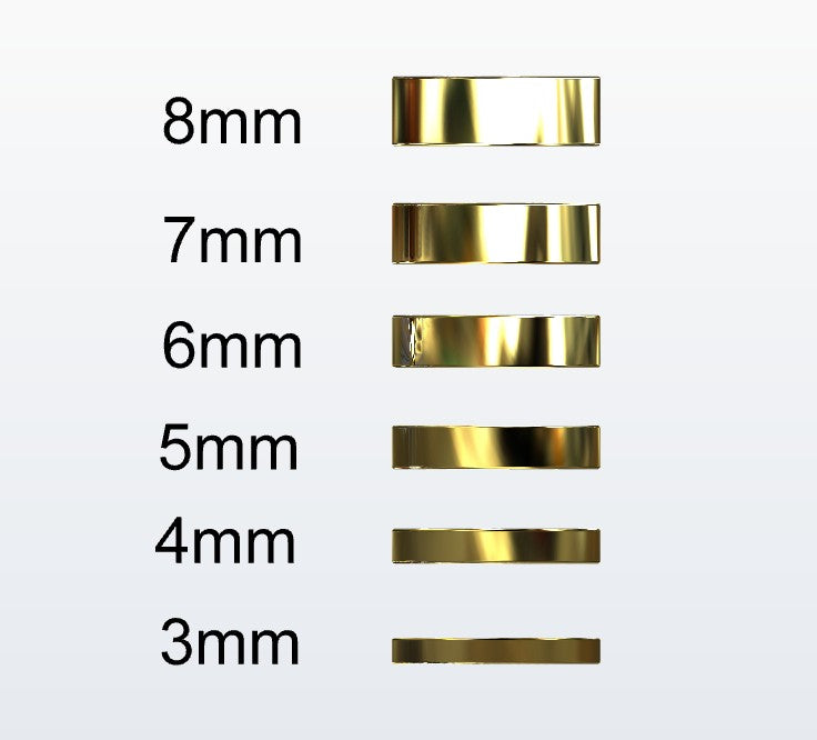 Set of gold flat profile rings with varying widths on a white background