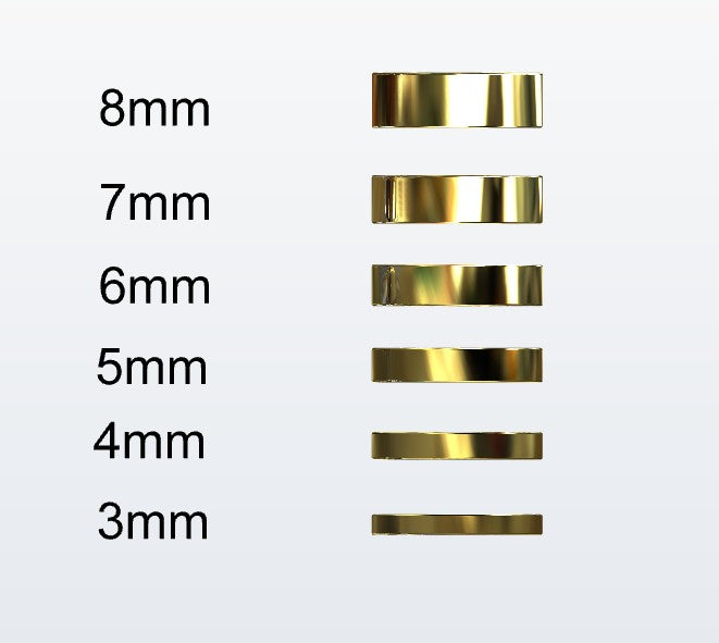 Set of gold flat profile rings with varying widths on a white background