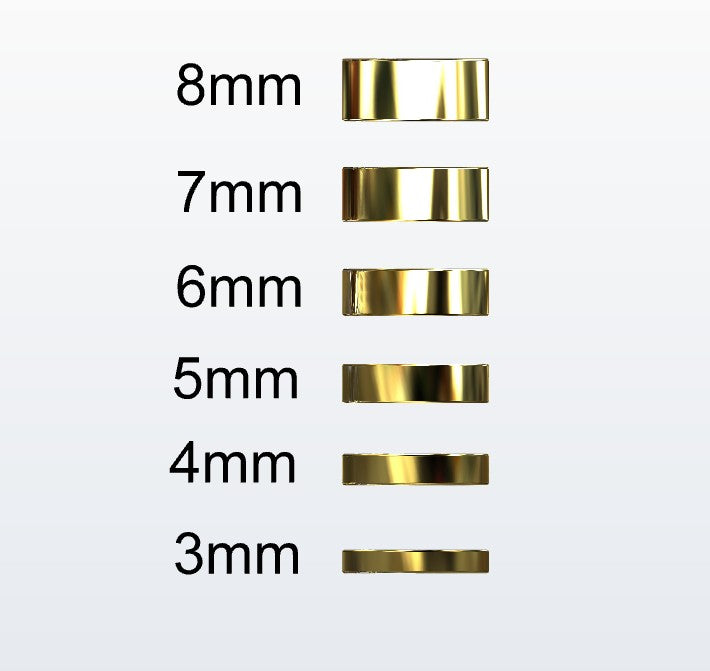 Set of gold flat profile rings with varying widths on a white background
