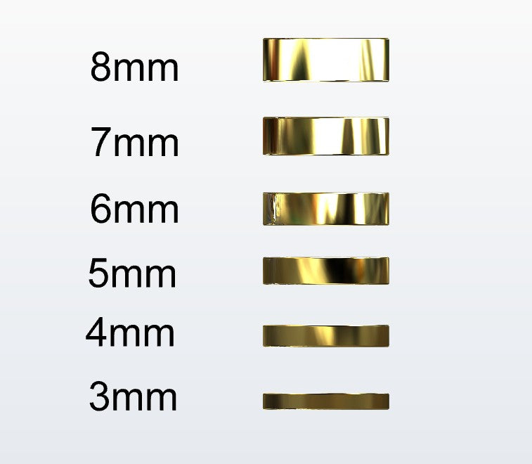 Set of gold flat profile rings with varying widths on a white background